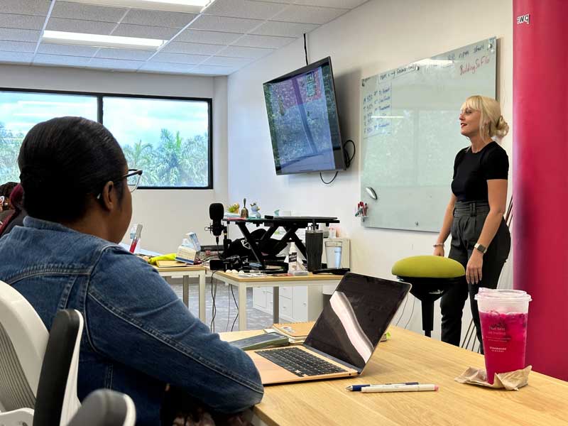 Zjolie Orr speaks to the class